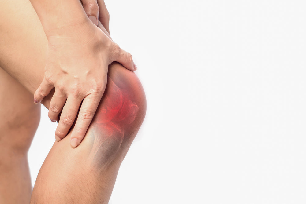 Close up of a knee with red inflammation to represent arthritis